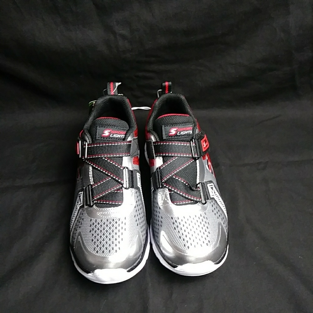 Sport by skecher boys lightup sneaker size 2. These have never been worn.
